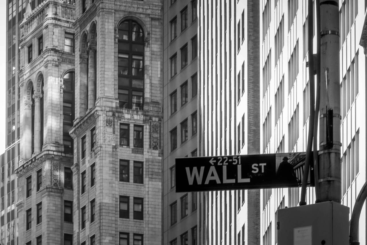 New Project (63) A black and white photo of the wall street sign.